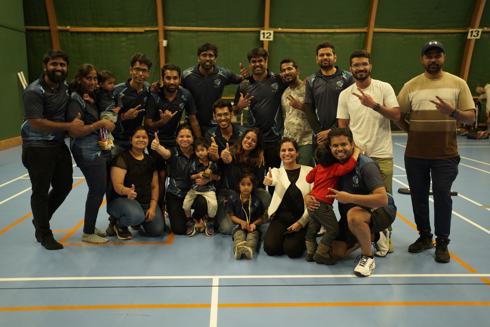 SSF members in club shirts at a sports hall